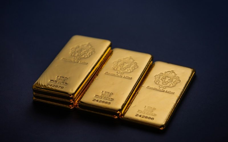 Three gold bars stacked on top of each other